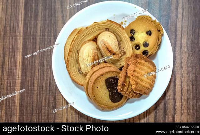 Cookies placed in a plate at a business meeting