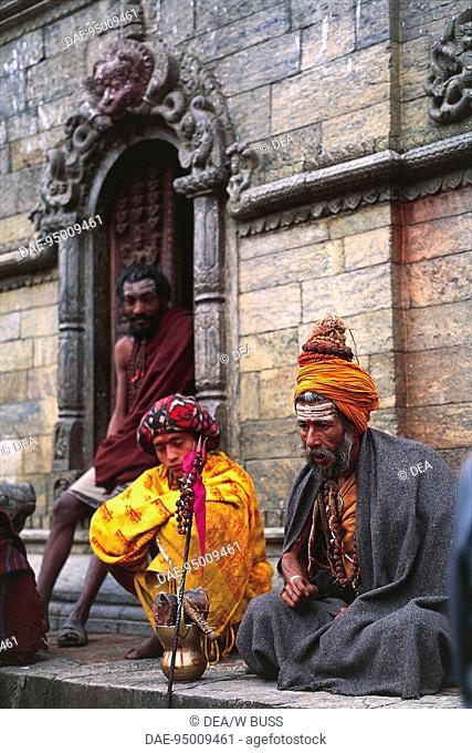 Nepal - Kathmandu Valley - Pashupatinath. Sadhu (holy man)outside a temple