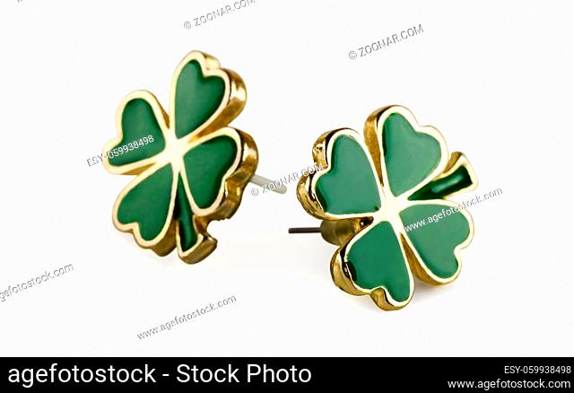 Four-leaf clover earrings on a white background