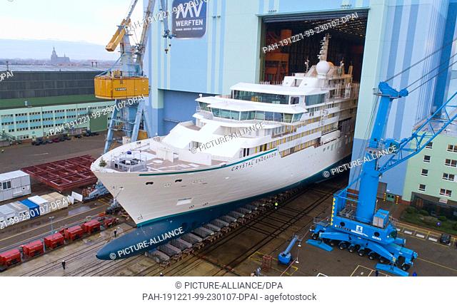 21 December 2019, Mecklenburg-Western Pomerania, Stralsund: The first newbuilding at the Stralsund MV shipyard for the Genting Group has left the shipbuilding...
