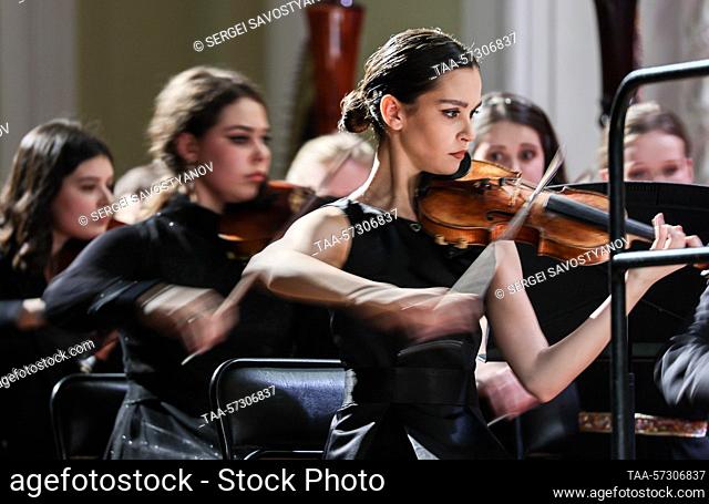 RUSSIA, MOSCOW - FEBRUARY 11, 2023: Concertmaster Valeria Abramova (R) performs during a concert as part of the closing ceremony of the 4th Moscow Winter...