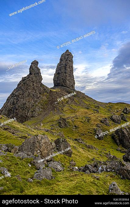 Old Man of Sotrr, big cliff, cloudy day, sun rays, mountain landscape, Skye Island, Highlands, Scotland