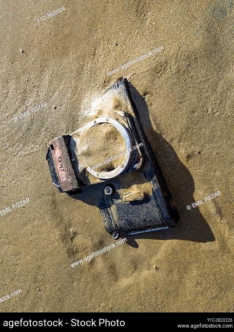 Nikon retro classic SLR film camera on beach view from above