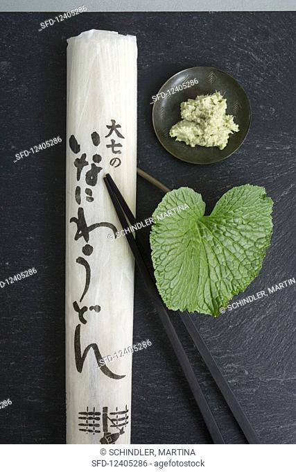 Udon noodles, a wasabi leaf and grated wasabi