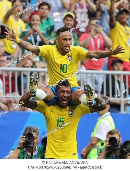 02 July 2018, Russia, Samara: Soccer, World Cup 2018, Final round - round of 16: Mexico vs. Brazil at the Samara stadium: Brazil's Neymar (top) celebrating his...
