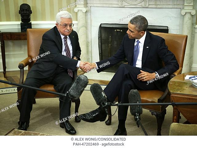 United States President Barack Obama (R) meets with Palestinian President Mahmoud Abbas (L) in the Oval Office of the White House in Washington, DC