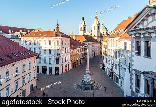 Panoramic aerial view of Town Square in Ljubljana, capital of Slovenia, at sunset. Empty streets of Slovenian capital during corona virus pandemic social...