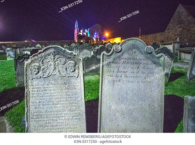 Grave stones at the Whitby Abbey during the Dracula festival on Halloween Yorkshire, UK