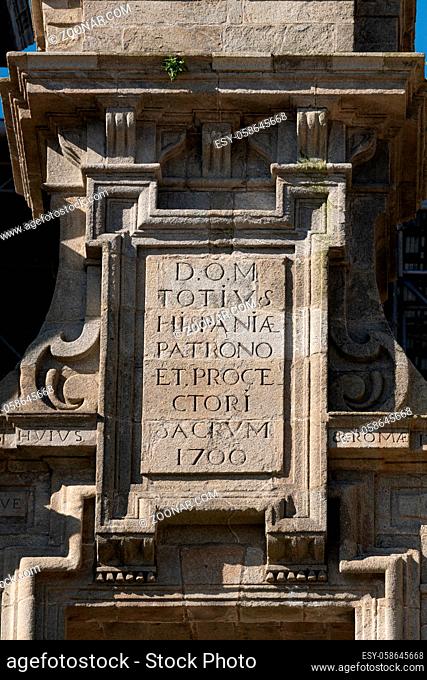 Detail of inscription on the east facade of the Cathedral of Santiago de compostela showing the commemoration of the proclamation of the patron saint of spain...