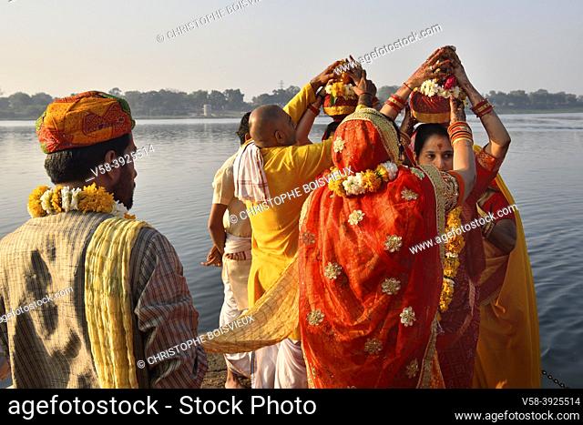 India, Madhya Pradesh, Maheshwar, Getting ready for a wedding procession on the banks of Narmada river
