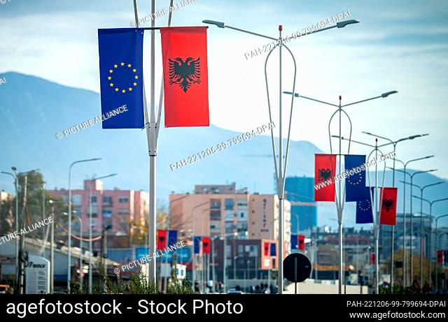 06 December 2022, Albania, Tirana: EU and Albanian flags fly in Tiranan at the EU-Western Balkans Summit. The topic of the summit is the EU accession prospects...