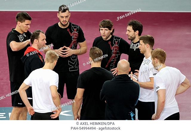 Germany's head coach Dagur Sigurdsson (2nd left) talks to his team during the training of Team Germany prior to the men's Handball World Championship 2015 at...