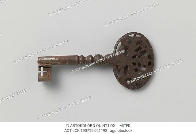 Key with oval handle, Tinned iron key. The handle is oval and cut away with abstracted flower and tendril motifs. Via three nodi the handle is connected to the...