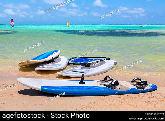 Windsurf boards lying on Sorobon beach by the sea of Bonaire