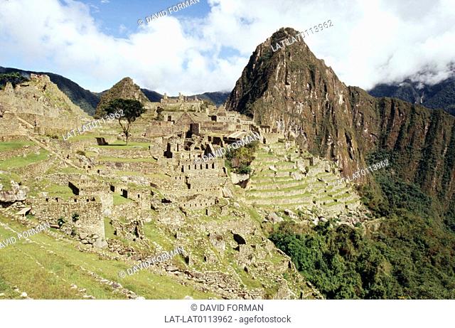An Inca site, located on a mountain ridge at 7, 970 ft, is known as the Lost City of the Incas with terraced stone walls and cliffs