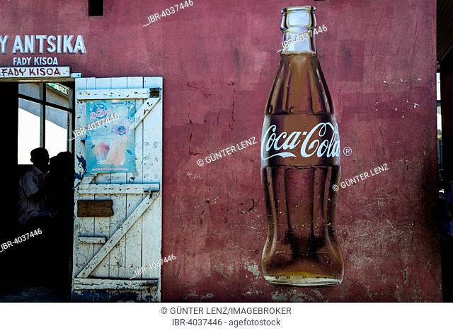 Coca Cola advertising and the open door of a restaurant, Morondava, Madagascar