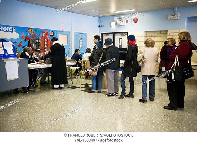 Voters on line to cast their ballots in New York in Washington Heights on election day Voters for the first time in a general election in New York used...