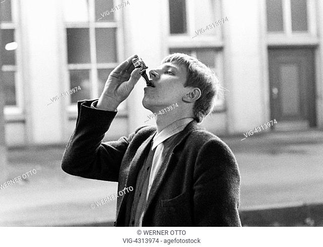 LUXEMBURG, LUXEMBURG, 16.08.1968, Sixties, black and white photo, people, health, alcohol, young man drinks a bitter, aged 20 to 25 years, Reiner - Luxemburg