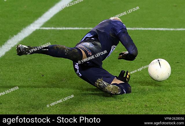 Gent's goalkeeper Sinan Bolat stops the penalty during a soccer match between KRC Genk and KAA Gent, Thursday 21 January 2021 in Genk