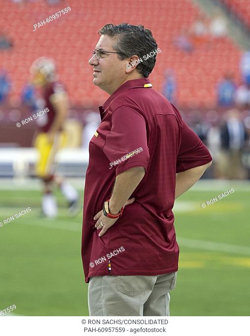 Washington Redskins owner Daniel M. Snyder watches his team warm-up prior to the preseason game against the Detroit Lions at FedEx Field in Landover