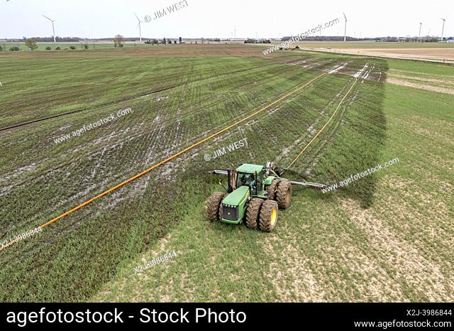 Elkton, Michigan - Cow manure is pumped onto a farm field as a fertilizer