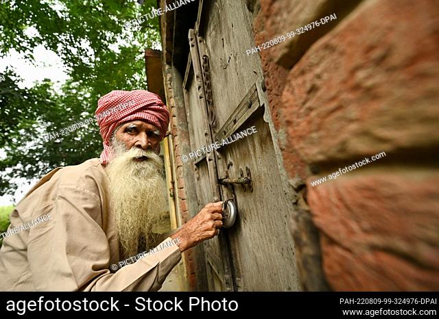 05 August 2022, India, Powt: Pritam Khan in front of his house in the village of Powt in the Indian state of Punjab. Pritam was about nine years old when the...