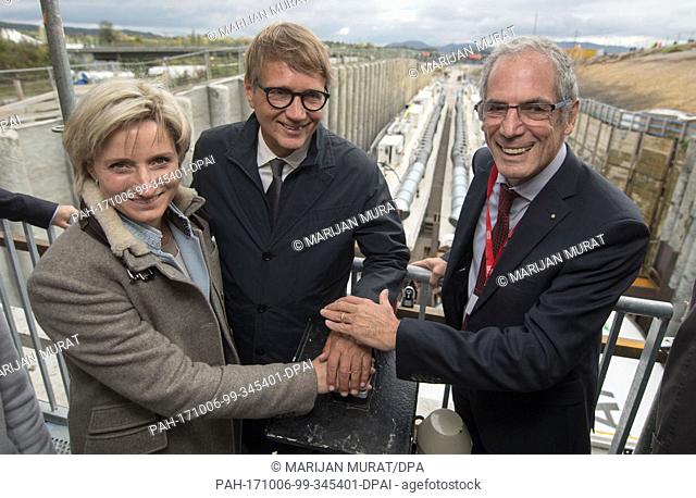 The minister of economy in Baden-Wuerttemberg Nicole Hoffmeister-Kraut (L-R), the board member of the Bahn AG, Ronald Pofalla and the chairman of the Implenia...