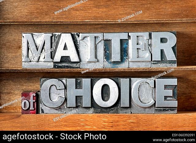 matter of choice phrase made from metallic letterpress type on wooden tray
