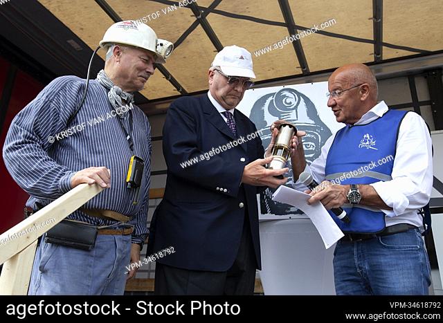 Prince Laurent of Belgium receives a gift from KS-vriendenkring's Michel Dylst during the Miner's Day and the inauguration of the 'Mijnwerkersplein' (Miners'...