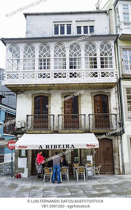 Bar at a traditional Galician architecture building with glass gallery at Viveiro, Lugo Province, Galicia, Spain, Europe