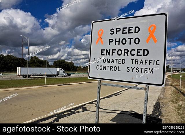 Speed photo enforced - sign on the expressway