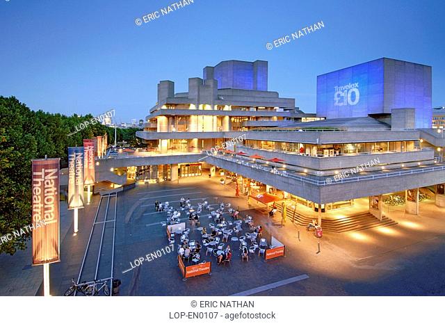 England, London, South Bank, The National Theatre on London's south bank at dusk. The theatre was designed by Sir Denys Lasdun and opened in 1976