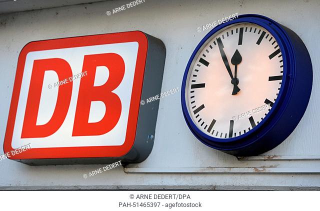 A station clock shows five minutes to twelve at the station in Fulda, Germany, 27 August 2014. The union Deutsche Lokomotivfuehrer (GDL) called the company of...