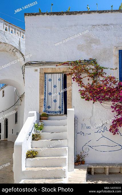 ostuni, brindisi province, apulia, italy. in the alleys of ostuni. ostuni is also called the white city