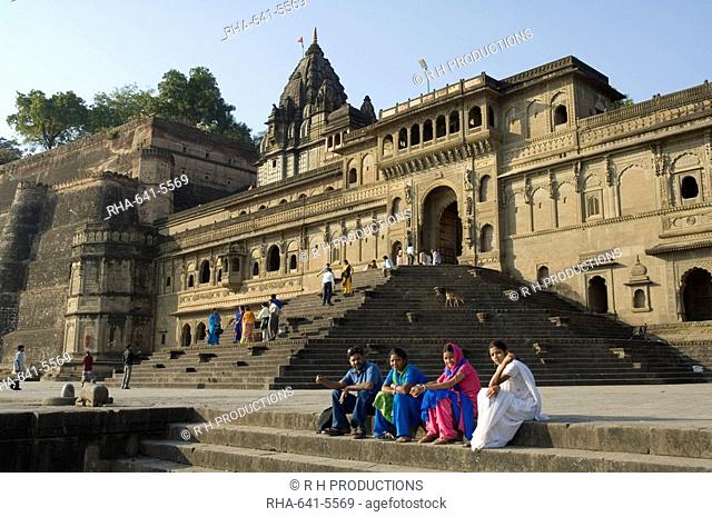 The ghats on the Narmada River at the Ahilya Fort and Temples, Maheshwar, Madhya Pradesh state, India, Asia