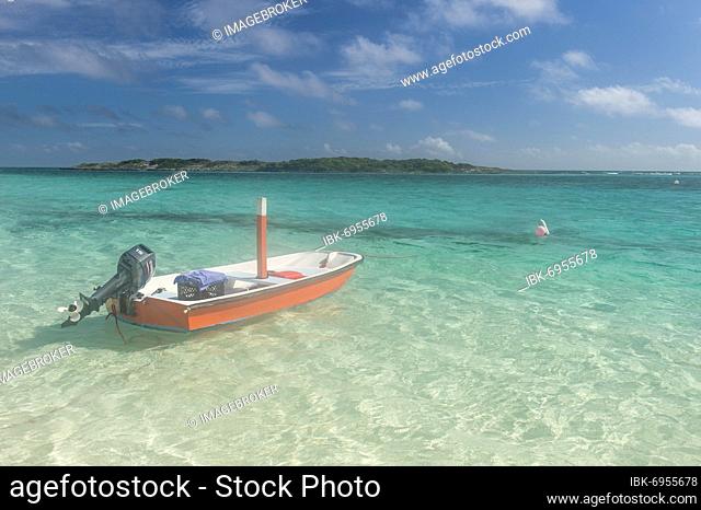 Little fishing boat in the turquoise waters of the Exumas, Bahamas, Caribbean, Central America