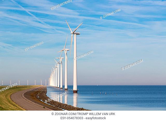 Long row off shore wind turbines along the Dutch coast