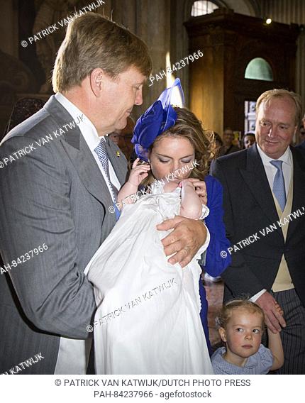 King Willem-Alexander of The Netherlands attends the christening of Prince Carlos de Bourbon de Parme together with father Prince Carlos (R)