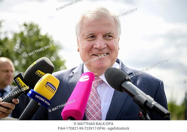 Prime Minister of the German state of Bavaria Horst Seehofer gives an interview on his arrival the opening of FC Bayern Munich's campus in Munich, Germany