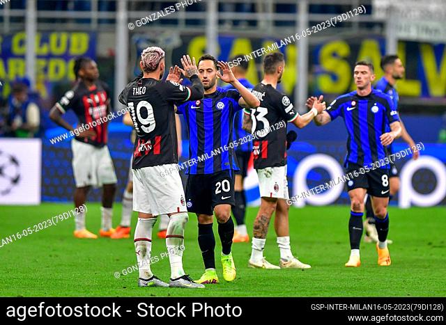 Milano, Italy. 16th, May 2023. Theo Hernandez (19) of AC Milan and Hakan Calhanoglu (20) of Inter seen after the UEFA Champions League match between Inter and...