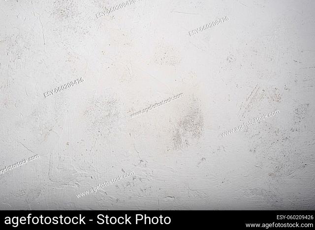 Gray textured concrete wall background. Copy space