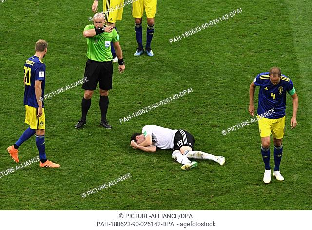 23 June 2018, Sochi, Russia - Soccer World Cup, Germany vs Sweden, Group Stage, Group F, 2nd matchday, Sochi Stadium: Sebastian Rudy from Germany lies on the...