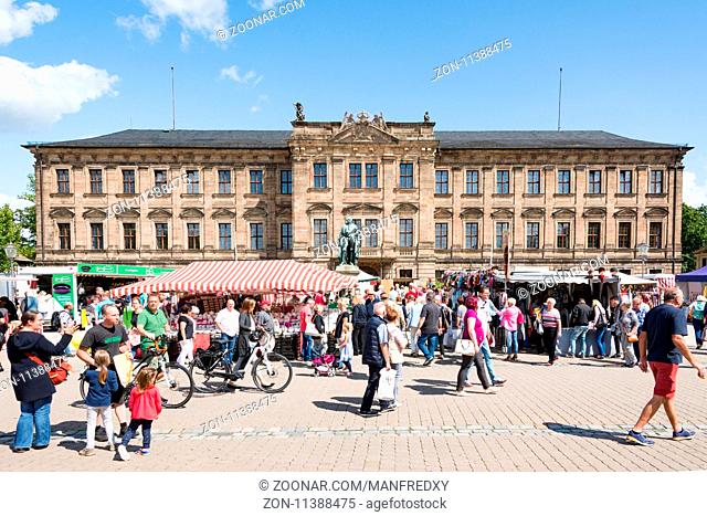 ERLANGEN, GERMANY - AUGUST 20: People at a market in front of Schloss Erlangen, Germany on August 20, 2017. The castle was built in the year 1700