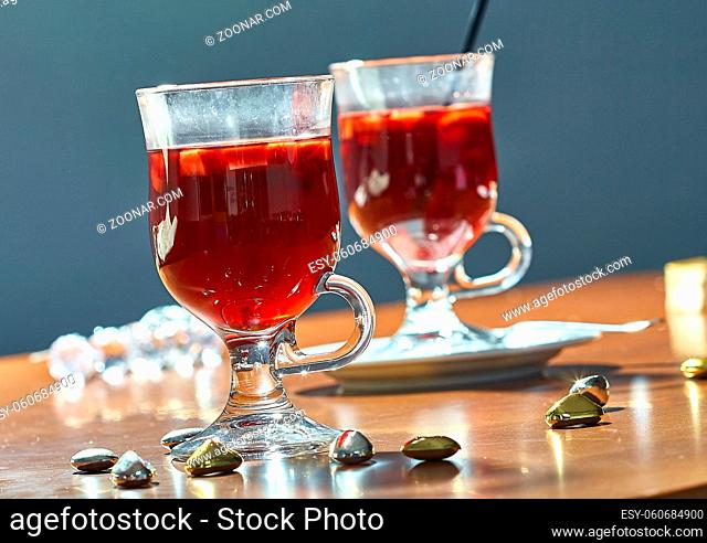 Hot mulled wine in a glass cup Christmas