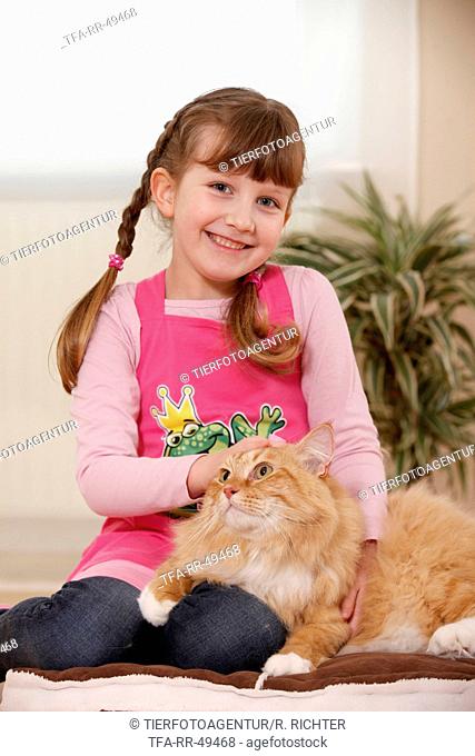 girl with siberian cat