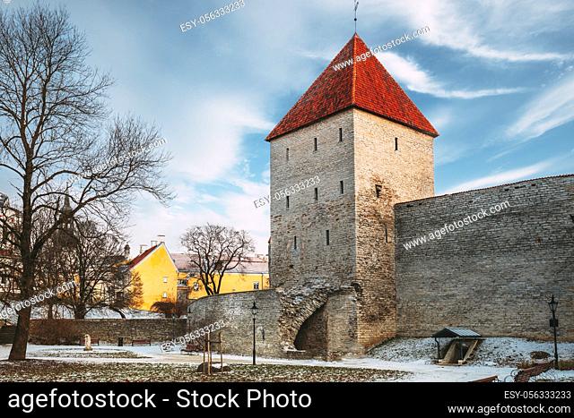 Tallinn, Estonia. Traditional Old Architecture In Old Town. Former Prison Tower Neitsitorn In Winter Day. Famous Landmark. Altered Sky