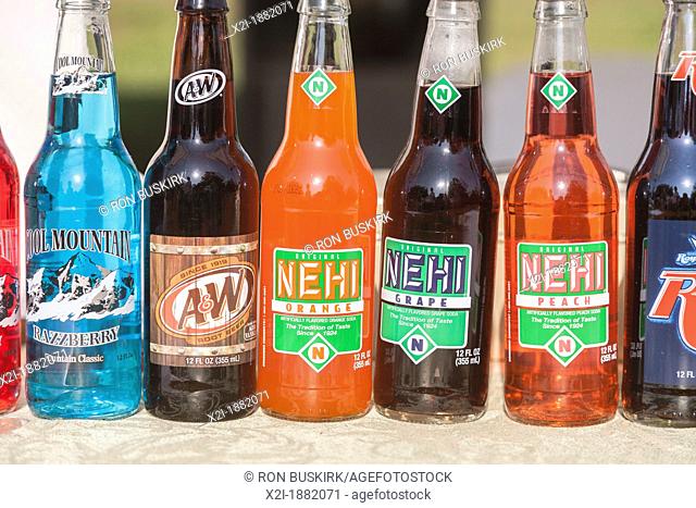 Bottles of classic Nehi, Cool Mountain, and A&W flavored soda soft drinks