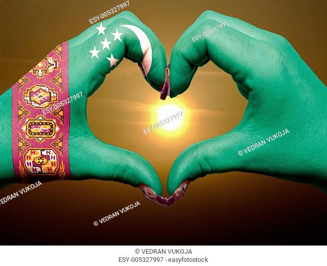Heart and love gesture by hands colored in turkmenistan flag dur