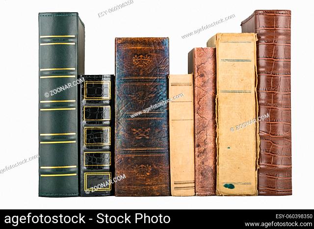 stack of old books with titles inserted by digitally altered