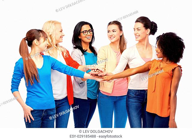 diversity, race, ethnicity and people concept - international group of happy smiling different women over white holding hands together